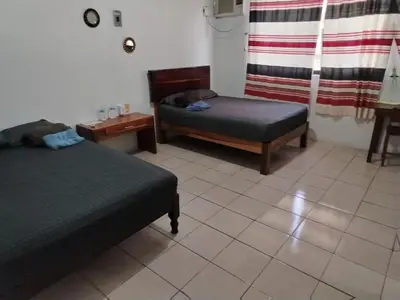 Cama o camas de una habitación en La casa de los abuelos