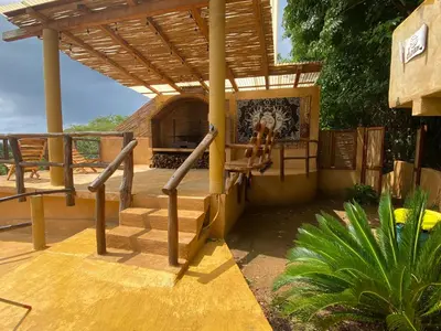 Un balcón o terraza de CASA CON AIRE ACONDICIONADO, PLAYA San Agustinillo Area