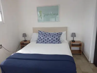 Cama o camas de una habitación en Casa El nido de las flores