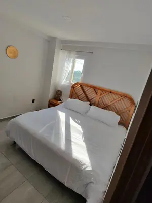Cama o camas de una habitación en HABITACIÓN Torres Palmas alberca, vista al mar, Roof Top VIP