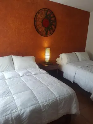 Cama o camas de una habitación en hotel quinta real las palmas malinalco