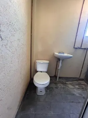 Un baño de Departamentos Apizaco Jardin de Toribio