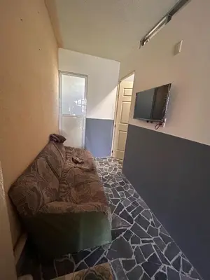 Una televisión o centro de entretenimiento en Departamentos Apizaco Jardin de Toribio