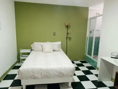 Cama o camas de una habitación en Rincón 