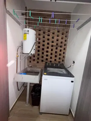 Una cocina o zona de cocina en Departamento Oasis