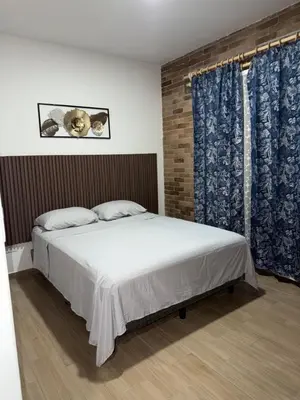 Cama o camas de una habitación en Departamento oasis