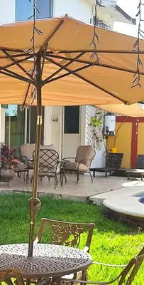Jardín al aire libre en Hermosa Casa Colibri