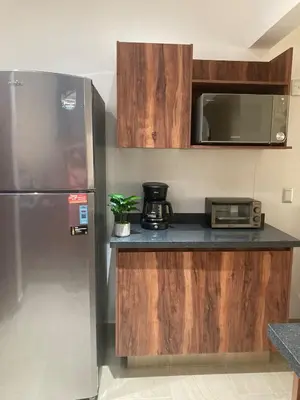 Una cocina o zona de cocina en An incredible luxury apartment on the ground floor in Vidamar Residencial