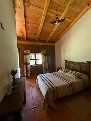 Cama o camas de una habitación en Rancho Campestre Virgen del Río