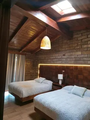 Cama o camas de una habitación en cabañas el rio alcatraz