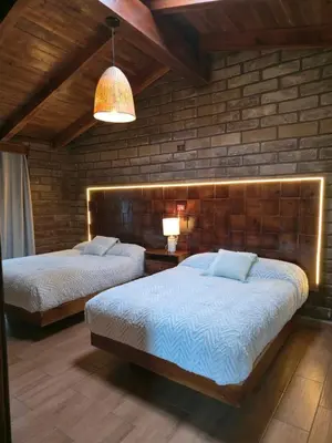 Cama o camas de una habitación en cabañas el rio alcatraz