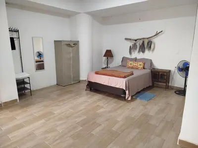 Cama o camas de una habitación en Bello departamento con jacuzzi y vista al mar