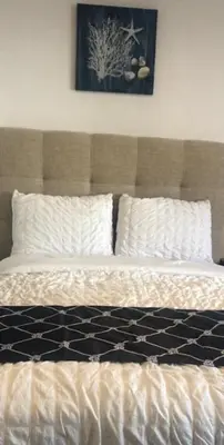 Cama o camas de una habitación en SKY INN Oficial Acapulco Suites & Condo Mediterrane