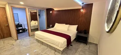 Cama o camas de una habitación en Hotel Olimpica Boutique