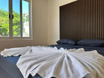 Cama o camas de una habitación en Casa Iguanas, ubicación inmejorable en la bahia principal