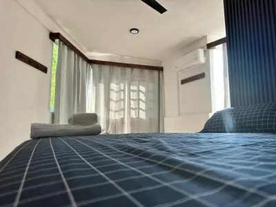 Cama o camas de una habitación en Casa Iguanas, ubicación inmejorable en la bahia principal