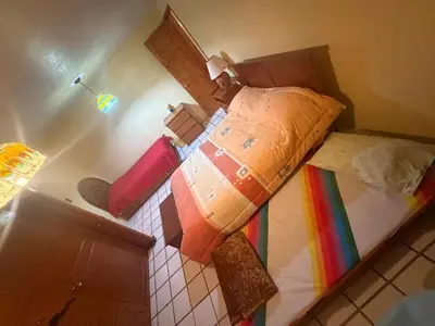 Cama o camas de una habitación en Alojamiento de descanso