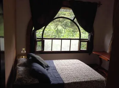 Cama o camas de una habitación en Casa Cafetal Coatepec