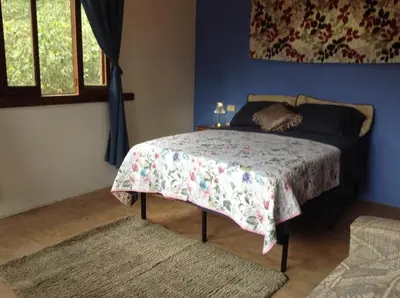 Cama o camas de una habitación en Casa Cafetal Coatepec