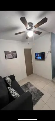 Una televisión o centro de entretenimiento en Apartamento 301