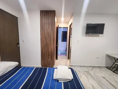 Cama o camas de una habitación en Depto 3 habitaciones cerca del Centro Expositor Puebla