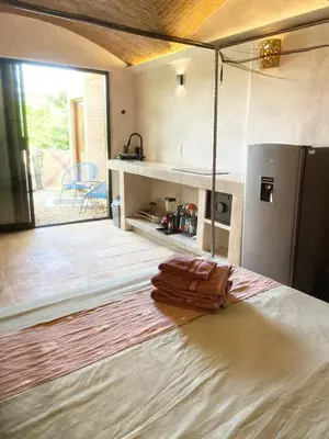 Cama o camas de una habitación en Casa Kino Estudio Sombra close to Rinconcito beach incl Starlink and airconditioning