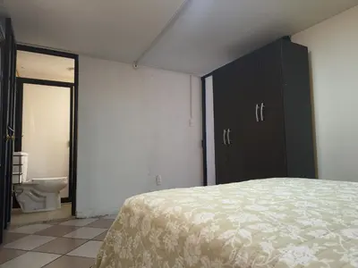 Cama o camas de una habitación en Rincon Hortensia apartments and loft