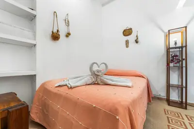 Cama o camas de una habitación en Suites Calle Berlin