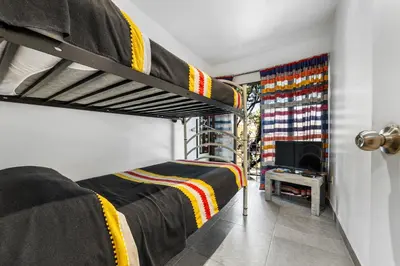 Cama o camas de una habitación en Suites Calle Berlin