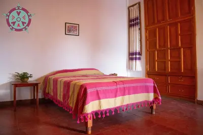 Cama o camas de una habitación en Casa Lua Oaxaca: Comfort y Cultura