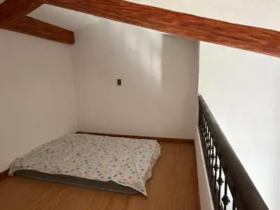 Cama o camas de una habitación en La casa de los abuelos