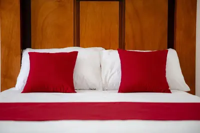 Cama o camas de una habitación en Hotel alcazar de luna