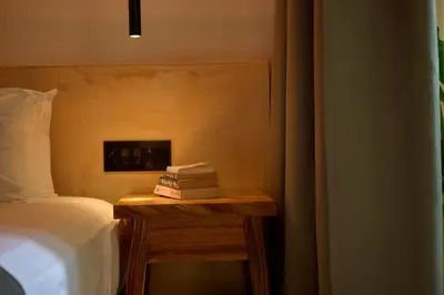 Cama o camas de una habitación en Hotel Compartir