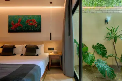 Cama o camas de una habitación en Hotel Compartir