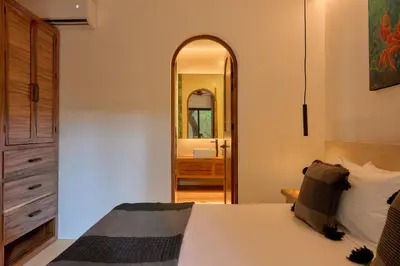 Cama o camas de una habitación en Hotel Compartir