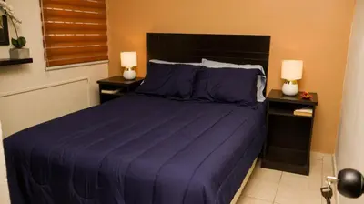 Cama o camas de una habitación en Pintoresca y Acogedora Casita Pueblo Mágico