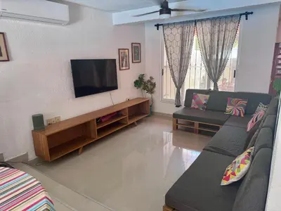 Una televisión o centro de entretenimiento en Casa Grillo Huatulco
