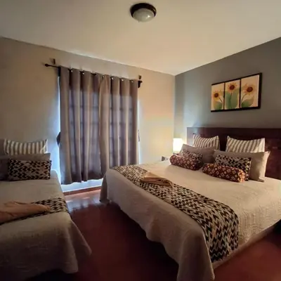 Cama o camas de una habitación en Hotel Hacienda Entabladero