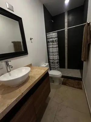 Un baño de Casa universo