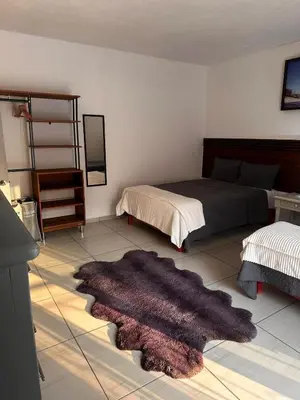 Cama o camas de una habitación en Casa Loma Bonita Cuernavaca