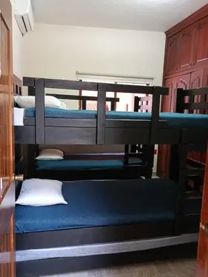 Cama o camas de una habitación en La Palma Yatzil