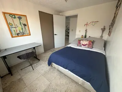 Cama o camas de una habitación en Private Sanctuary in Coyoacán Private Room & Bathroom Curated Coyoacán experience