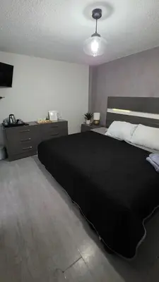 Cama o camas de una habitación en Habitación privada Six Flags, Estadio azteca