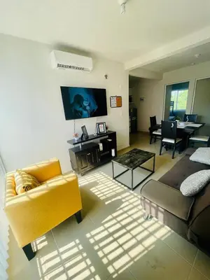 Zona de estar de Acapulco Vibes - Departamento con Alberca Cerca de Punta Diamante