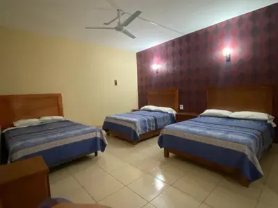 Cama o camas de una habitación en Hotel Jocari