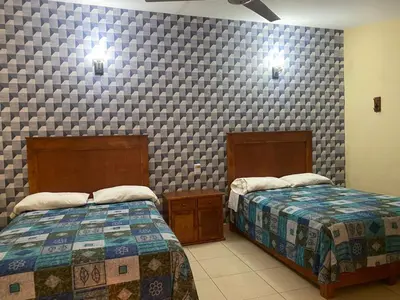 Cama o camas de una habitación en Hotel Jocari