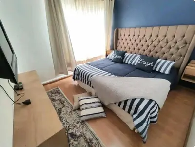 Cama o camas de una habitación en Apartamento de 3 recámaras en el corazón de puebla