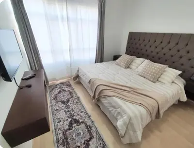 Cama o camas de una habitación en Apartamento de 3 recámaras en el corazón de puebla