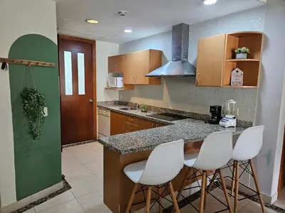 Una cocina o zona de cocina en Mar y Lago 203