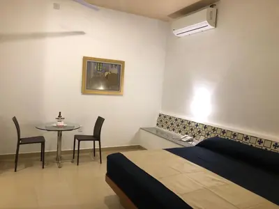 Zona de estar de Hotel Roma